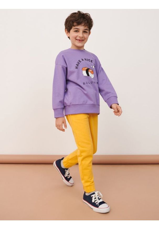 Sinsay - Spodnie dresowe jogger - żółty. Kolor: żółty. Materiał: dresówka