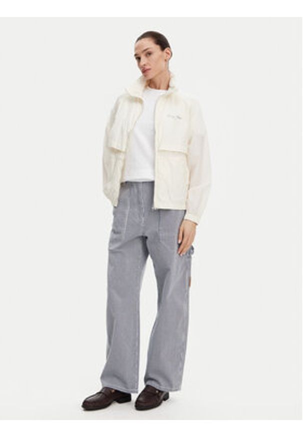 TOMMY HILFIGER - Tommy Hilfiger Wiatrówka WW0WW45413 Beżowy Regular Fit. Kolor: beżowy. Materiał: syntetyk