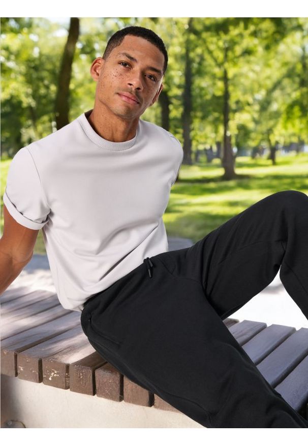 Sinsay - Spodnie - czarny. Kolor: czarny. Długość: długie