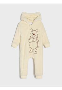 Sinsay - Kombinezon z kapturem Winnie the Pooh - kremowy. Kolor: kremowy