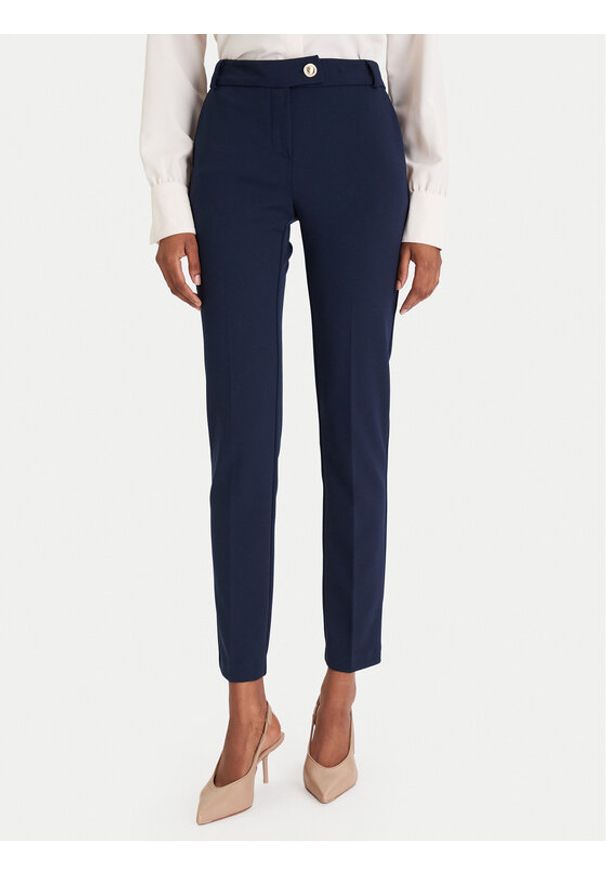 Rinascimento Chinosy CFC0126226003 Granatowy Slim Fit. Kolor: niebieski. Materiał: syntetyk