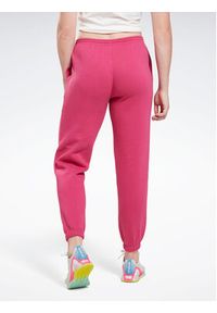 Reebok Spodnie dresowe Identity H54768 Różowy Regular Fit. Kolor: różowy. Materiał: bawełna, dresówka, syntetyk