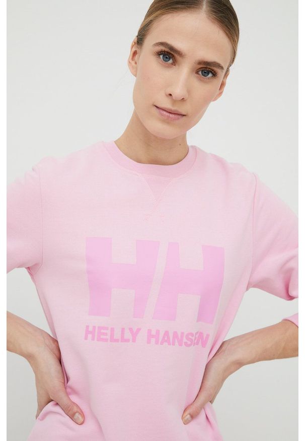 Helly Hansen bluza damska kolor różowy z nadrukiem. Okazja: na co dzień. Kolor: różowy. Materiał: dzianina, bawełna. Długość rękawa: długi rękaw. Długość: długie. Wzór: nadruk. Styl: casual
