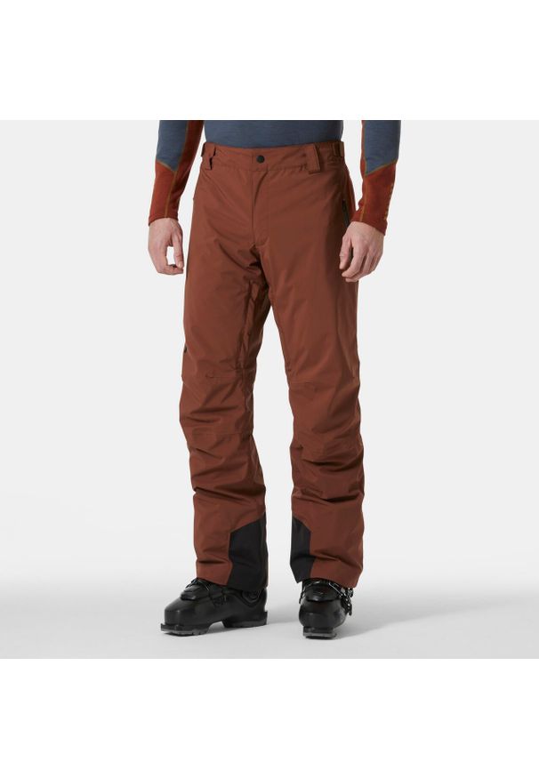 Spodnie narciarskie Helly Hansen Legendary. Kolor: pomarańczowy. Sezon: zima. Sport: narciarstwo