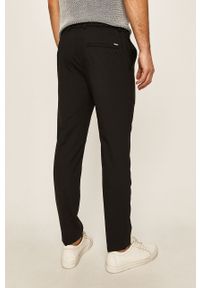 Calvin Klein - Spodnie. Kolor: czarny. Materiał: wełna, bawełna, materiał, elastan, tkanina, poliester. Wzór: gładki #4