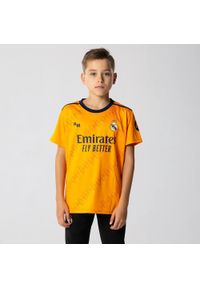 Koszulka piłkarska dla dzieci Real Madrid Away 24/25. Kolor: pomarańczowy. Sport: piłka nożna #1