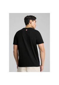 Puma - Męska koszulka Portugalia ftblNRGY PUMA Black. Kolor: czarny. Wzór: napisy