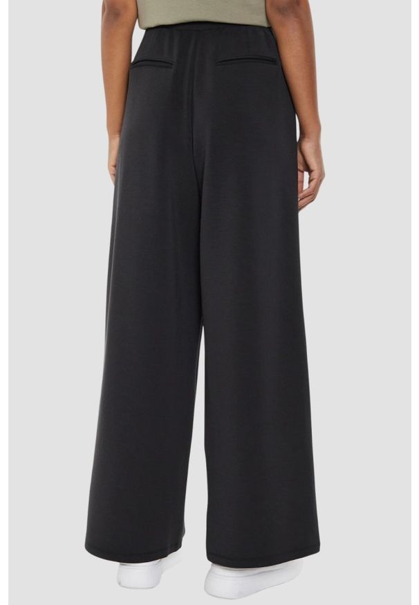 Guess - GUESS Czarne damskie spodnie dresowe Olympe Wide Leg, Rozmiar S. Kolor: czarny. Materiał: dresówka