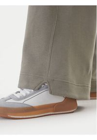 Adidas - adidas Spodnie dresowe ALL SZN Fleece JY5014 Beżowy Wide Leg. Kolor: beżowy. Materiał: bawełna #4