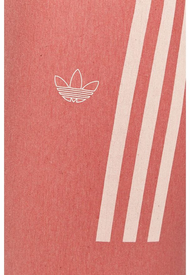 adidas Originals - Spodnie GN4399. Kolor: różowy. Materiał: dzianina. Wzór: nadruk