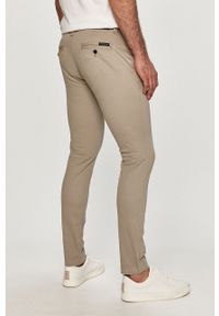 Calvin Klein Jeans - Spodnie. Kolor: szary. Materiał: tkanina, bawełna, elastan. Wzór: gładki #2