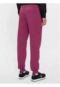 Calvin Klein Jeans Spodnie dresowe J30J324053 Fioletowy Regular Fit. Kolor: fioletowy. Materiał: bawełna, syntetyk #5