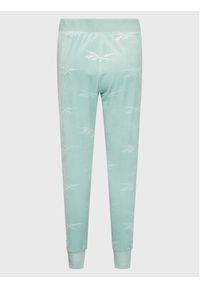 Reebok Spodnie dresowe Classics Energy Q4 HH9804 Niebieski Slim Fit. Kolor: niebieski. Materiał: dresówka, welur
