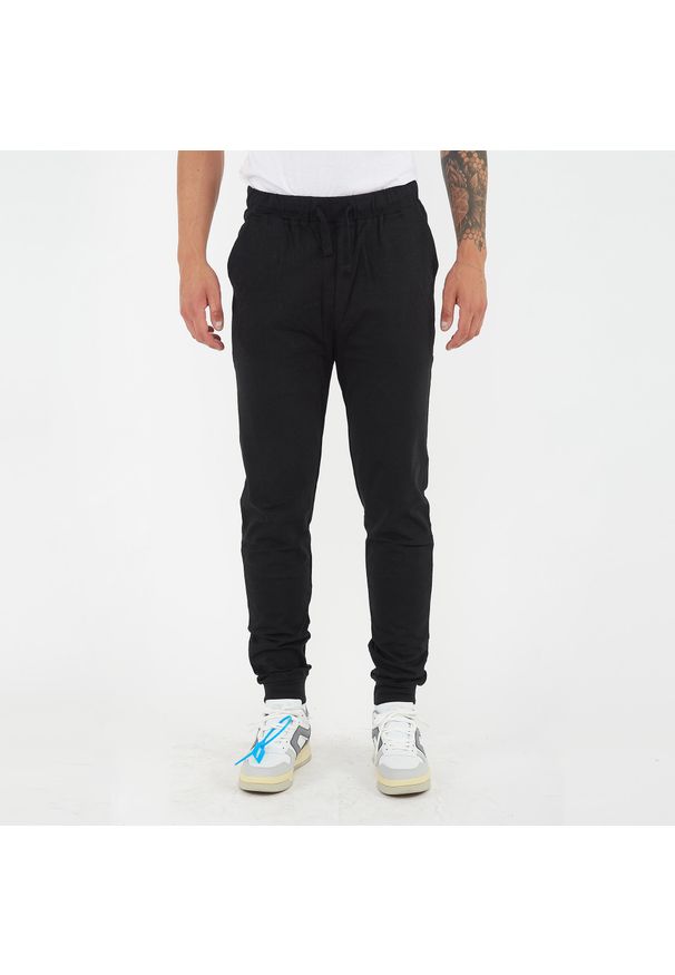 LEGEA - spodnie fitness męskie fiondo czarne. Kolor: czarny. Materiał: bawełna. Sport: fitness