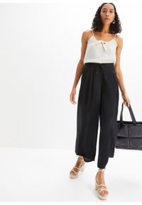 bonprix - Spodnie culotte z lejącej satyny. Kolor: czarny. Materiał: satyna #2