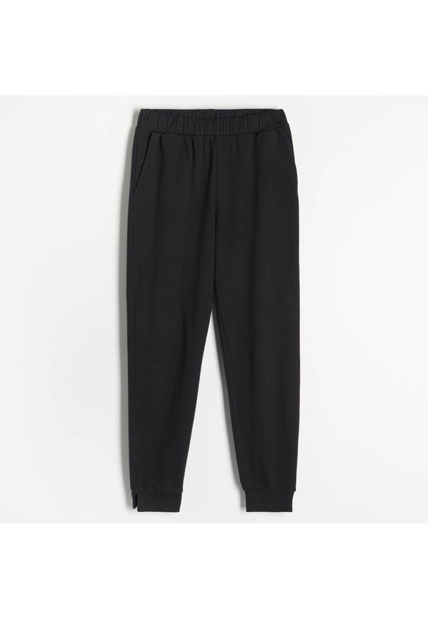 Reserved - Spodnie z dresowej dzianiny - Czarny. Kolor: czarny. Materiał: dresówka, dzianina