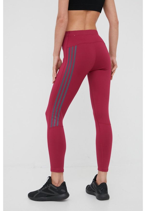 adidas Performance legginsy do biegania Run Icons damskie kolor fioletowy z nadrukiem. Okazja: na plażę. Kolor: fioletowy. Materiał: skóra, dzianina, materiał. Wzór: nadruk. Sport: bieganie