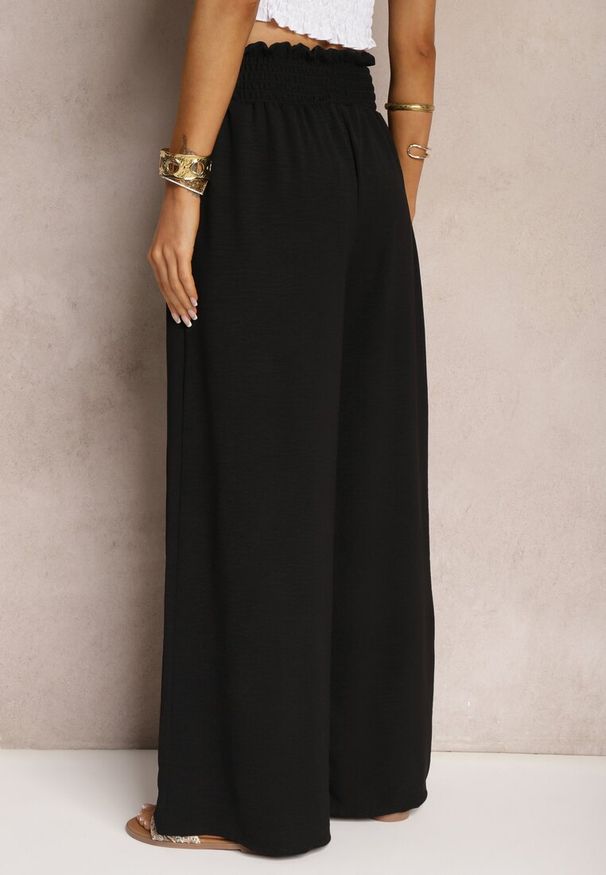 Renee - Czarne Spodnie High Waist z Szerokimi Nogawkami i Gumką w Pasie Risabessa. Okazja: na co dzień. Stan: podwyższony. Kolor: czarny. Styl: elegancki, casual
