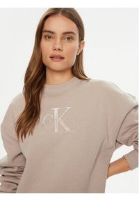 Calvin Klein Jeans Sukienka dzianinowa J20J224834 Beżowy Relaxed Fit. Kolor: beżowy. Materiał: syntetyk, bawełna