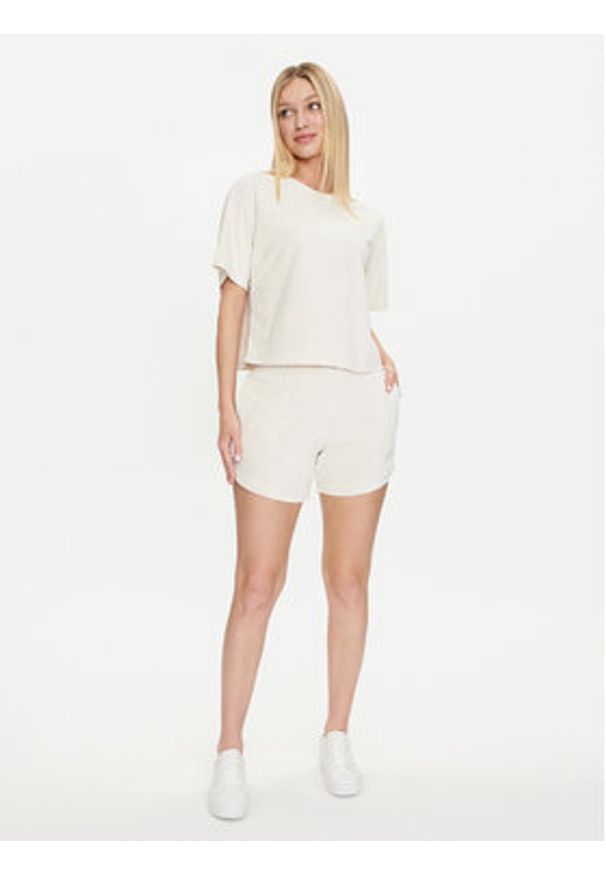 Puma T-Shirt Ess Elevated 677947 Écru Regular Fit. Materiał: bawełna