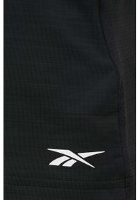 Reebok top treningowy Activchill Athletic H49099 kolor czarny. Kolor: czarny. Materiał: materiał. Długość rękawa: na ramiączkach