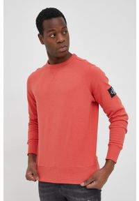 Calvin Klein Jeans bluza bawełniana męska kolor pomarańczowy gładka. Okazja: na co dzień. Kolor: pomarańczowy. Materiał: bawełna. Wzór: gładki. Styl: casual