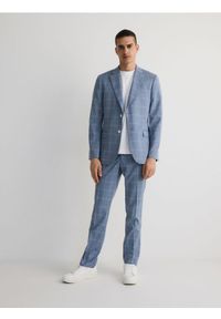 Reserved - Spodnie garniturowe slim fit - niebieski. Kolor: niebieski. Materiał: tkanina, wiskoza