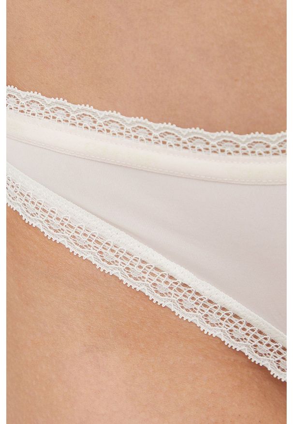 Calvin Klein Underwear stringi (3-pack) kolor beżowy. Kolor: beżowy. Materiał: materiał. Wzór: gładki