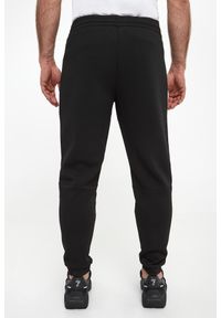 EA7 Emporio Armani - Spodnie dresowe meskie EA7 EMPORIO ARMANI. Materiał: dresówka