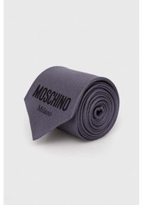MOSCHINO - Moschino krawat kolor szary. Kolor: szary. Materiał: materiał. Wzór: gładki