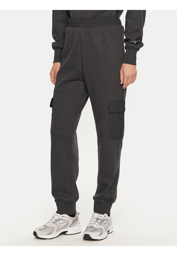 Champion Spodnie dresowe 117499 Szary Regular Fit. Kolor: szary. Materiał: syntetyk