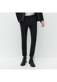 Reserved - Dzianinowe spodnie chino - Czarny. Kolor: czarny. Materiał: dzianina #1