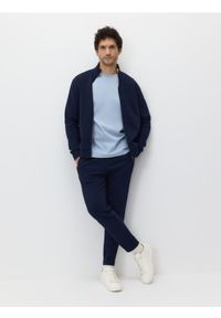 Reserved - Spodnie dresowe slim - granatowy. Kolor: niebieski. Materiał: dresówka #1