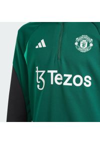Bluza do piłki nożnej dla dzieci Adidas Manchester United Tiro 23 Training. Kolor: czarny, zielony, wielokolorowy. Materiał: materiał