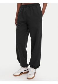 Reebok Spodnie dresowe Reebok x Ewa Chodakowska Ada RK25621CCW Czarny Relaxed Fit. Kolor: czarny. Materiał: syntetyk #1