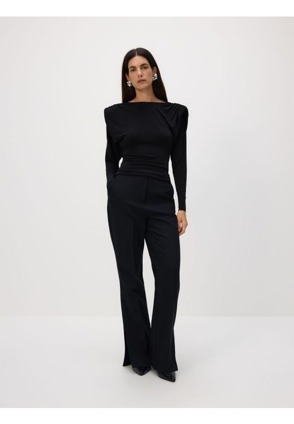 Reserved - Spodnie z rozcięciami long leg - czarny. Kolor: czarny. Materiał: tkanina, wiskoza