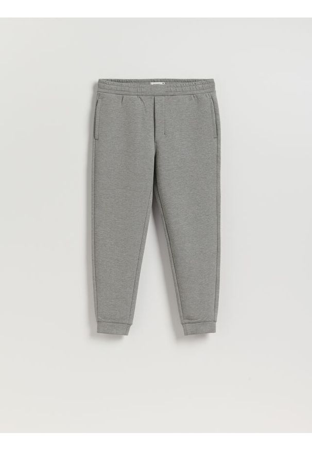 Reserved - Spodnie dresowe slim fit - jasnoszary. Kolor: szary. Materiał: dresówka