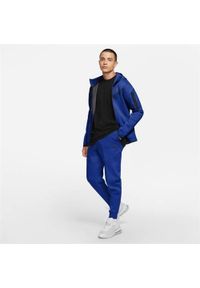 Spodnie sportowe męskie Nike Tech Fleece. Kolor: niebieski. Materiał: dresówka