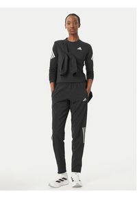 Adidas - adidas Spodnie dresowe Astro KC4947 Czarny Regular Fit. Kolor: czarny. Materiał: syntetyk #2