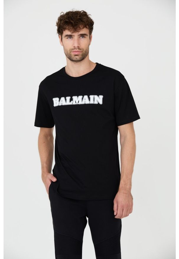 BALMAIN Czarny t-shirt z białym logo Retro Balmain Flock. Kolor: czarny. Styl: retro