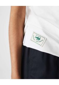 Lacoste - LACOSTE - Biały t-shirt z logo Unisex Fit. Kolor: biały. Materiał: bawełna. Styl: klasyczny #2