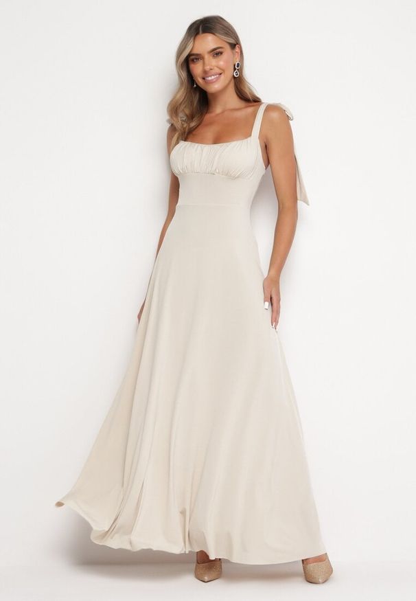 Born2be - Beżowa Rozkloszowana Sukienka Maxi z Wiązanymi Ramiączkami Lisija. Kolor: beżowy. Długość rękawa: na ramiączkach. Styl: elegancki. Długość: maxi