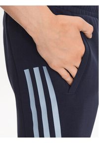 Adidas - adidas Spodnie dresowe Future Icons 3-Stripes Joggers IJ6373 Niebieski Slim Fit. Kolor: niebieski. Materiał: dresówka, bawełna