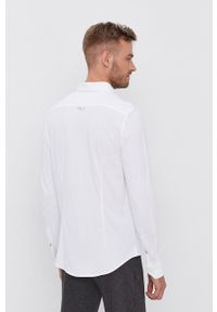 Calvin Klein Jeans - Koszula bawełniana. Okazja: na co dzień. Typ kołnierza: kołnierzyk klasyczny. Kolor: biały. Materiał: bawełna. Długość rękawa: długi rękaw. Długość: długie. Styl: casual, klasyczny #5
