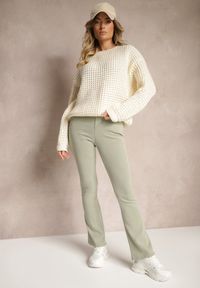 Renee - Jasnozielone Spodnie o Kroju Dzwonów z Bawełną Gumką w Talii i Imitacją Suwaka Mialyse. Kolor: zielony. Materiał: bawełna. Wzór: aplikacja. Styl: elegancki