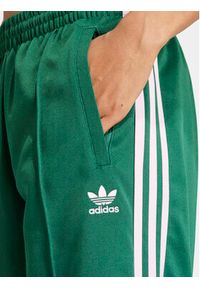 Adidas - adidas Spodnie dresowe adicolor Classics SST IM9818 Zielony Loose Fit. Kolor: zielony. Materiał: bawełna #3