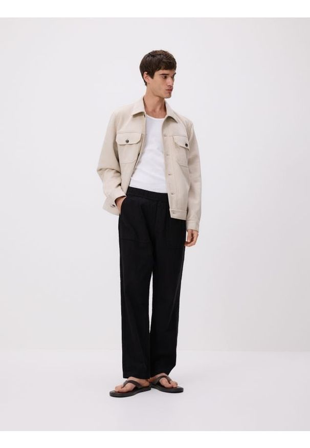 Reserved - Bawełniane spodnie jogger - czarny. Kolor: czarny. Materiał: bawełna