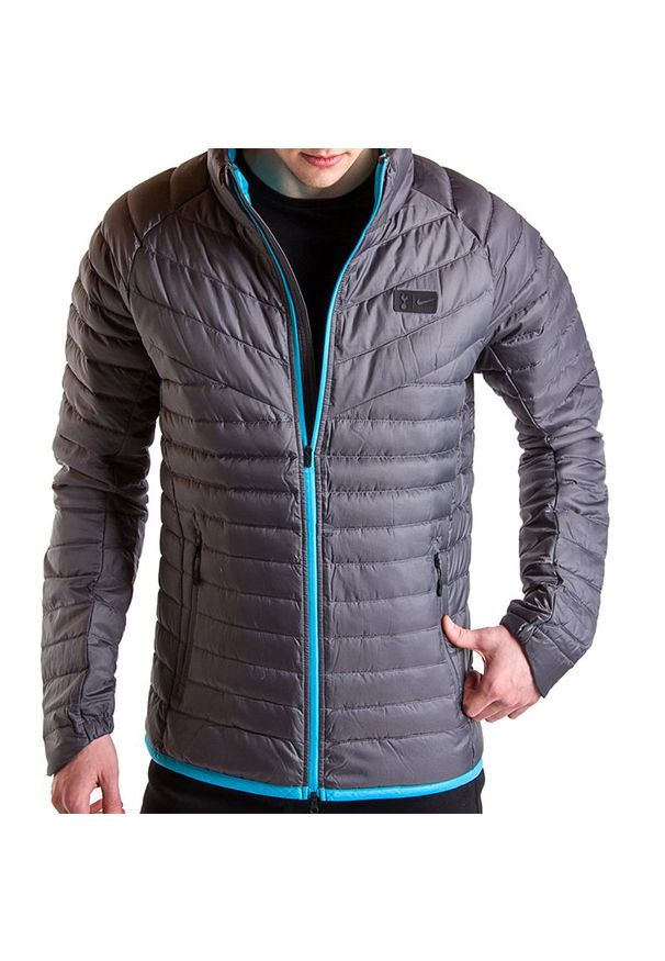 Nike - NIKE TOTTENHAM DOWN JACKET NSW > CI1307-021. Materiał: materiał, poliester