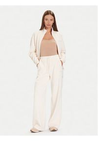 Guess Spodnie dresowe V5BB12 KCX22 Beżowy Wide Leg. Kolor: beżowy. Materiał: syntetyk #3