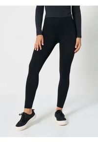 Sinsay - Legginsy sportowe - czarny. Kolor: czarny. Styl: sportowy